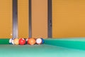 Billiard balls in the corner of the pool table Royalty Free Stock Photo