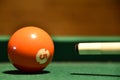 Billiard balls and cue on the pool table Royalty Free Stock Photo