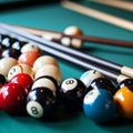 Billiard balls on green billiard table with shallow depth of field