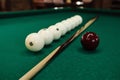 Billiard balls and pool sticks