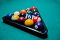 Billiard balls in a pool table at triangle Royalty Free Stock Photo