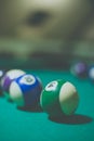 Billiard balls in a pool table. Vintage style noise effect Royalty Free Stock Photo