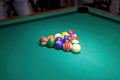 Billiard balls on the table for the game. Pool table set up for start Royalty Free Stock Photo