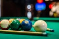 Billiard balls on the table and the player's hands are preparing to strike in the start mode. Royalty Free Stock Photo