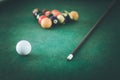 Billiard in a bar, queue and balls on the table, quitting time Royalty Free Stock Photo