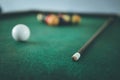 Billiard in a bar, queue and balls on the table, quitting time Royalty Free Stock Photo