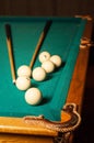 Billiard cue and balls on a green table Royalty Free Stock Photo
