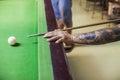 Billiard cue ready to hit white ball Royalty Free Stock Photo