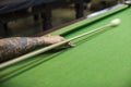 Billiard cue ready to hit white ball Royalty Free Stock Photo