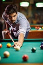 Billiard game- young man playing snooker