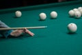 Billiard green table in hall with white balls Royalty Free Stock Photo