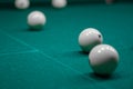 Billiard green table in hall with white balls Royalty Free Stock Photo