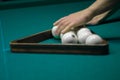 Billiard green table in hall with white balls Royalty Free Stock Photo