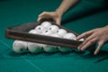 Billiard green table in hall with white balls Royalty Free Stock Photo