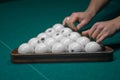 Billiard green table in hall with white balls Royalty Free Stock Photo