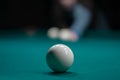 Billiard green table in hall with white balls Royalty Free Stock Photo