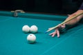 Billiard green table in hall with white balls Royalty Free Stock Photo