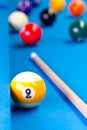 Billiard pool game nine ball with cue on billiard table Royalty Free Stock Photo