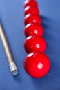 Billiard pool stick with red balls row