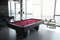 Billiard room with a beautiful modern interior in summer day at Royalty Free Stock Photo