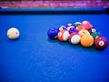 Billiard snooker pyramid balls on pool blue table Royalty Free Stock Photo