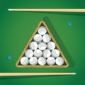 Billiard stick and white pool balls in triangle on green table for game. Biliard balls, triangle and cue for game on Royalty Free Stock Photo
