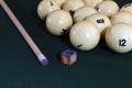 Billiard table with balls, cue, triangle. Green cloth. Playing billiard and pool. Ruusian billiard Royalty Free Stock Photo