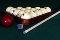 Billiard table with balls, cue, triangle. Green cloth. Playing billiard and pool. Ruusian billiard Royalty Free Stock Photo