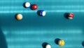 Billiard table with multi-colored balls