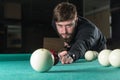 Billiards. man plays billiards. leisure. cue Royalty Free Stock Photo