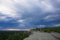 A cyclist begins to ride after taking in the views at Swords Park, which overlooks the city of Billings, MT Royalty Free Stock Photo