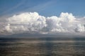 Billowing Clouds On Ocean At Sunset