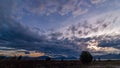 Billowing Clouds Over A Field 