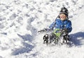 Young boy sledging