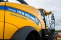 Bilohir`ya, Khmelnytsky region, Ukraine - August 15, 2019: Presentation of agricultural technology - New Holland logo on new