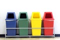 Bin, green, blue, yellow and red recycle bins with recycle waste symbol, Four colorful recycle bins garbage on wall white