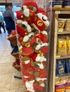 A bin of stuffed Bucees Beaver mascot at a Buc ees