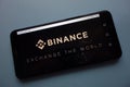 Binance cryptocurrency exchange logo displayed on smartphone Royalty Free Stock Photo