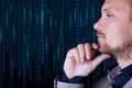 Binary code. A businessman looks at a background of digital binary code numbers. Copy space Royalty Free Stock Photo