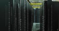 Binary code and communication icons image over data center servers Royalty Free Stock Photo