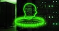 Binary code forming human head over digital data processing in green image Royalty Free Stock Photo