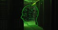 Binary code and human head image over data servers in dark room Royalty Free Stock Photo