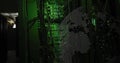 Binary code image over green-lit server racks in data center Royalty Free Stock Photo