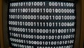 Binary Code on Retro Computer Monitor Royalty Free Stock Photo