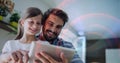 Binary coding data processing against caucasian father and daughter using digital tablet at home Royalty Free Stock Photo