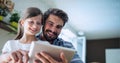 Binary coding data processing against caucasian father and daughter using digital tablet at home Royalty Free Stock Photo
