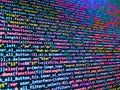 Binary computer code background, abstract. Programmer working in computer screen. Developer working on program codes in office. Royalty Free Stock Photo