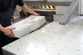 Bindery. Paper trimming on a guillotine