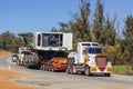 BINDOON, AUSTRALIA - Sep 15, 2012: Oversize loads of mining machinery are transported by truck to the iron ore mines in the