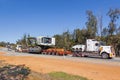 BINDOON, AUSTRALIA - Sep 15, 2012: Oversize loads of mining machinery are transported by truck to the iron ore mines in the